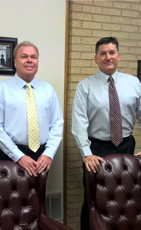 Businessman standing with arms crossed